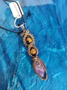 Amethyst and tiger's eye wrapped in "aged" copper wire, entirely handmade Aged Copper, Valentines Day Birthday, Amethyst Necklace, Tiger's Eye, Gift Christmas, Tiger Eye, Copper Wire, Ideal Gift, Jewelry Necklace Pendant