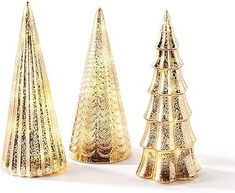 three small gold christmas trees on a white background