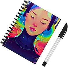 a spiral notebook with an image of a woman's face and headphones on it