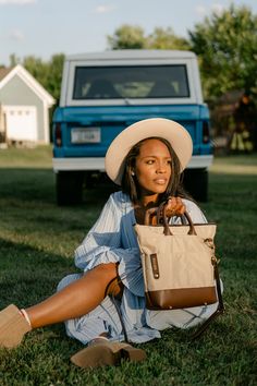 The medium tote is the quintessential companion for the woman on the go. Balancing size and functionality, it offers ample space for your daily essentials without overwhelming your frame. Perfect for work, a day out, or a casual weekend trip, this tote combines style with practicality. The Otto medium tote is the quintessence of where elegance meets ethical fashion, offering the modern woman a way to look good, feel good, and do good simultaneously. Its sleek, versatile design is the perfect bal Trendy Travel Bag With Canvas Lining, Canvas Shoulder Bag With Detachable Handle For Travel, Canvas Travel Shoulder Bag With Detachable Handle, Travel Canvas Shoulder Bag With Detachable Handle, Versatile Bags With Canvas Lining For On-the-go, Chic Travel Shoulder Bag With Canvas Lining, Chic Shoulder Bag With Canvas Lining For Travel, Trendy On-the-go Bag With Canvas Lining, Top Handle Travel Bag With Canvas Lining