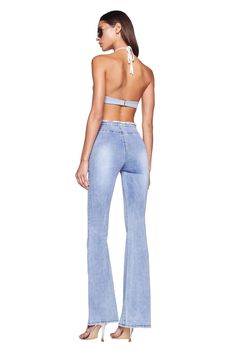 Details Best-selling Nevah Denim Pant Light Blue wash is back Low-mid rise waist and flared silhouette Flattering V-shaped waistband with fringe detailing Adjustable drawstring detail at front waist - Can be tucked in Features sandblasting effect on thighs and on behind Side seam zipper Recommended Underwear: Due to the low-rise fit, we recommend wearing this garment with a seamless low-rise brief Size and Fit True to size. We recommend wearing your standard size Low to mid rise. Rise is adjusta Drawstring Detail, Denim Flares, Buy Now Pay Later, Denim Pant, V Shape, Denim Pants, Fabric Care, Low Rise, Casual Pants