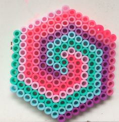 a circular object made out of plastic beads