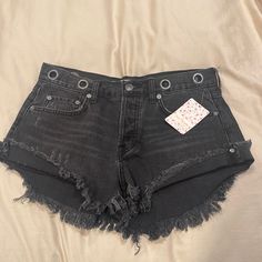 Womens Free People Brand New With Tags Black Denim Shorts! Size 26! With Cut Out Grommet Holes. Super Stylish And Cute. 100% Cotton. High Rise Black Jean Shorts With Belt Loops, Edgy Black Jean Shorts, Edgy Black Denim Jean Shorts, Edgy High-waisted Black Jean Shorts, Black Distressed Cotton Jean Shorts, Black Mid-rise Jean Shorts With Belt Loops, Free People Shorts Black, People Brand, Free People Shorts