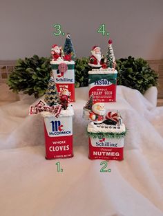 three boxes with christmas decorations and numbers on them