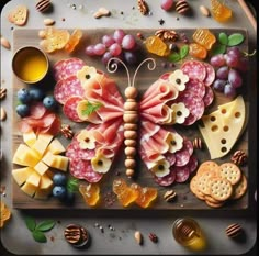 a wooden board topped with lots of different types of food