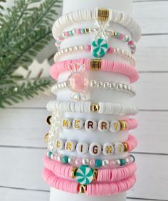 Darling Pink Christmas bracelet set. A combination of pink and holiday aesthetic, makes this a wonderful gift to wear or share. Wear as a set or as a single bracelet. Beaded Bracelets Aesthetic, Holiday Bracelets, Single Bracelet, Holiday Aesthetic, Christmas Bracelet, Pink Christmas, Bracelet Stack, Holiday Spirit, Gold Accents