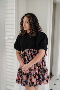 Elevate your style with our gorgeous Marta Dress! Featuring a stunning mix of black and floral fabrics, this dress boasts a boucle top and a contrasting woven skirt for a unique and eye-catching look. The empire waist and puff sleeves with tie detail add a touch of femininity and charm. Get ready to turn heads and feel confident in this must-have dress! Floral Fabrics, Us Beaches, Floral Fabric, Feel Confident, Empire Waist, Puff Sleeves, Puff Sleeve, Must Haves, Turn Ons