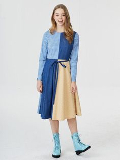 This is a romantic dress with two different  colors of check pattrns and denim. It looks so colorful with cool blue,  bright yellow and denim. The patterns in the front and back  are arranged in different grids. This makes unique and cute atmosphere.   The waistband creates a slim fit  that makes a beautiful body line. The model wore size of M(40). Lining / Slight Sheer / Moderate Thickness / Slight Stretch ▶Composition Outshell1 - Cottn 33%   Polyester 53%   Nylon 14% Outshell2 - Polyester 100% Spring Blue Plaid Cotton Dress, Casual Patchwork Denim Dress For Fall, Denim Blue Knee-length Patchwork Dress, Spring Cotton Plaid Long Sleeve Dress, Spring Long Sleeve Cotton Plaid Dress, Spring Long Sleeve Plaid Cotton Dress, Plaid Patchwork Dress For Fall, Casual Long Sleeve Patchwork Denim Dress, Fitted Blue Plaid Dress For Spring