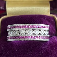 "Details: Fabulous wide vintage Diamond and Ruby eternity band, that would look great stacked! Band has bright pink Rubies and diamonds making a fun and bright band. Sides of the band has lovely engraving, adding a little bit more sparkle to the look. There are hallmarks on the interior of the band reading \"bkc\", 18K, and BK. Please ask all necessary questions prior to placing an order. Measurements: The size is 6 1/2 US and can not be sized. Condition: The overall all condition of this ring i Pink Diamond Half Eternity Band, Pink Half Eternity Diamond Band, Classic Pink Half Eternity Jewelry, Pink Ruby Ring With Diamond Accents, Pink Ruby Ring With Pave Setting For Anniversary, Anniversary Pink Ruby Ring With Pave Setting, Pink Half Eternity Diamond Ring, Pink Diamond Eternity Band For Anniversary, Pink Diamond Half Eternity Ring