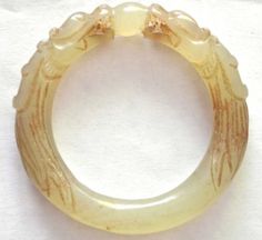 Antique-18-9th-Century-Chinese-White-Jade-Dragon-with-Ball-Small-Bangle-Bracelet Luxury Carved Jewelry For Formal Occasions, Luxury Engraved Jade Jewelry, Luxury Carved Jewelry For Weddings, Luxury Collectible Round Bangle, Antique White Bracelet Jewelry, White Antique Bracelet Jewelry, White Antique Bracelet, Traditional Carved Jewelry For Formal Occasions, Elegant Collectible Jade Jewelry