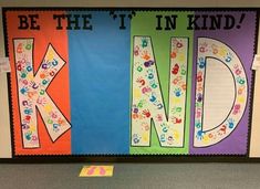 a bulletin board with the words be the it in kind written on it