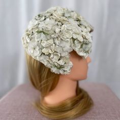 "Vintage sweet white flower Fascinator hat. A beautiful addition to your costume, or a smart accessory for a lovely social event! Perfect for Christmas, New Year's Eve, or Valentine's day. Attach with hair pins or glue a comb in, as it has no attachment for the hair. Vintage sale item, sold as is. All of my vintage items show some wear and age. I bought them worn and loved and wore them with love. Mannequin head is smaller than the average head. My head is approx 22.5\", and this fits me ok.  NE Vintage Spring Wedding Headpieces, Vintage Cream Fascinator For Royal Ascot, Cream Vintage Fascinator For Royal Ascot, Vintage Cream Fascinator For Garden Party, Vintage Headpiece For Church In Spring, Vintage Spring Headpieces For Church, Cream Fascinator For Spring Garden Party, Vintage Spring Headband Headpiece, Spring Cream Fascinator For Garden Party