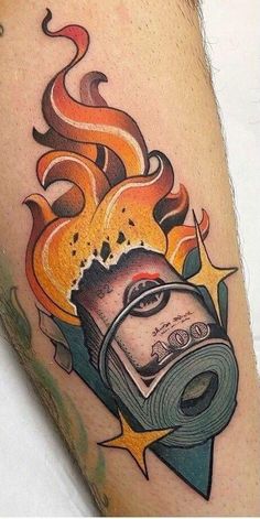 a man's arm with a burning roll of money on it and flames coming out of the back