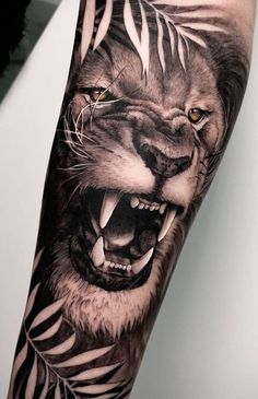 a man with a tiger tattoo on his arm