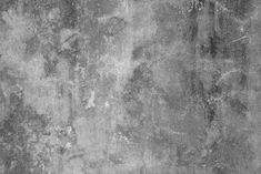 a black and white photo of an old wall