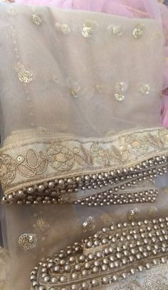 This is a Dupatta made on orders.It is made using net fabric with gold sequine embroidery all over. Then we stitch a beautiful golden lace to all sides of it. And beaded on two width sides of Dupatta.Dupatta is having a length of 100 inches and width of around 40 inches.I don't keep it readymade I only make it exclusively for my customers.Can be fully customised. Net Dupatta Designs, Dupatta Ideas, Duppattas Designs Ideas, Golden Dupatta, Indian Wedding Bridesmaids, Fancy Scarf, Coffee Hair, Simple Saree Designs, Suit Salwar