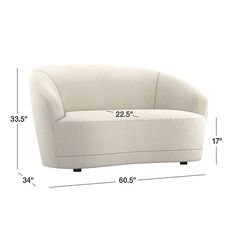 a white couch with measurements for it