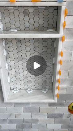 an overhead view of a bathroom with hexagonal tiles