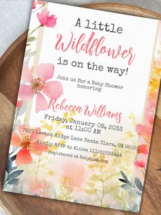 a little wildflower is on the way baby shower card with pink and yellow flowers