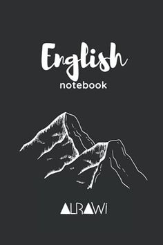 an english notebook with mountains in the background