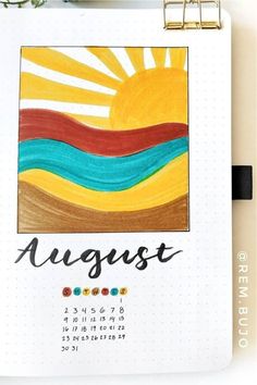 a calendar with the word august painted on it