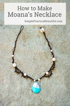 a necklace that has been made to look like it is in the sand with pearls and beads