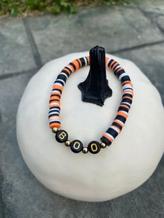 "This unique Halloween (black & orange) heishi bracelets will add the perfect style for spooky season!  This bracelet makes a \"fa-BOO-lous\" pair to any Halloween theme bracelet from this shop! (see photo #3 with it paired with black and orange Halloween bracelet!) The bracelets are stretchy, comfortable and water resistant." Halloween Themed Black Bracelet, Black Themed Bracelet For Halloween, Black Halloween Themed Bracelet, Handmade Black Heishi Beads Stretch Bracelet, Bracelets Heishi, Teacher Bracelet, Heishi Bracelets, Halloween Bracelet, Unique Halloween