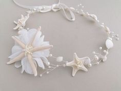 Starfish Hair Vine, Beach Wedding, shell Hair Accessories, Mermaid Headpiece, beach Tiara, Bridal Hair Vine, Seashell Headband, shell crown, boho A magnificent beach wedding accessory for the bride, flower girl, and bridesmaid. size: approx.  18'' (45cm.) I am open to custom orders. To see more wedding accessories, please click here: https://www.etsy.com/shop/NLcreation?ref=hdr_shop_menu Shipping & Policies **Please, read and examine the item you are thinking about purchasing carefully. Please r White Adjustable Hair Accessories For Beach, Adjustable White Hair Accessories For Beach, Adjustable White Hair Accessories For The Beach, White Shell For Wedding, Shell Hair Accessories, Mermaid Headdress, Starfish Headpiece, Seashell Tiara, Seashells Hair Accessories