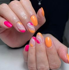 44 Pink and Orange Nails To Brighten Up Your Mani! Orange And Pink Dip Nails, Pink Orange Acrylic Nails, Orange And Pink Short Nails, Neon Nails Pink And Orange, Pink Orange And White Nails, Pink And Orange Swirl Nails, Pink Orange And Yellow Nails, Pink Orange Nails Summer, Bright Pink And Orange Nails