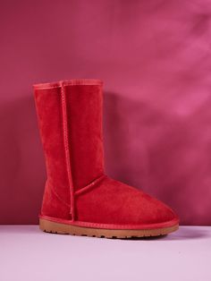 These high quality boots by SMAIBULUN™ Ugg exude elegance and sophistication. Made with premium suede, they provide comfort and style for any occasion. The classic red color adds a touch of vibrancy to your wardrobe. Perfect for the stylish and exclusive individual. 1'' heel 11.5'' shaft 15.5'' circumference Pull-on Suede upper Faux fur lining Man-made EVA sole Red Suede Boots For Winter, Classic Boots With Red Sole, Classic Red Winter Boots, High Quality Boots, Reindeer Headband, Hello Winter, Ugg Classic, Eva Sole, Daily Dress