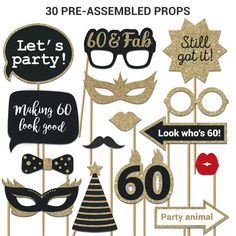 party photo booth props with gold glitter and black masks on sticks for 50th birthday decorations