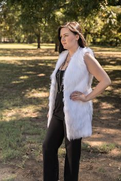 Classic and chic White Angora faux fur long vest with deep pockets on both sides and hidden hook and eye front closure. Extremely soft and luxurious high quality faux fur! Great fitting and easy to wear makes this the perfect way to add a little style to any dressy or casual attire. Fully lined with high quality satin. 100% high quality soft faux fur. Hand made in the USA. Sizes available in S, M, L, XL Hand wash cold, hang to dry. Most items from our shop ship within 1-2 business days. VIEW PIC Sleeveless Fur Coat With Faux Fur Trim, Sleeveless Faux Fur Coat With Fur Trim, Sleeveless Faux Fur Coat, Sleeveless Fur Coat With Faux Fur Lining For Fall, Sleeveless Faux Fur Coat For Fall, Sleeveless Faux Fur Outerwear, Sleeveless Fur Coat With Faux Fur Trim For Fall, Chic Faux Fur Vest For Fall, Fur Vest Outfits