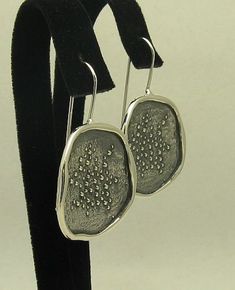 Sterling silver earrings 925/1000. Stamped 925.Approximate weight 14.4 grams. Diameter 2.6cm. All our jewels are made from solid sterling silver 925/1000 and are carefully crafted by hand in our family workshop. We dispatch your orders in 5 working days, worldwide and the postage is $5. We ship registered priority mail. Please allow 5-7 working days for delivery in Europe and 10-15 working days outside Europe. For any questions - please do not hesitate to contact me! Unique White Gold Pierced Earrings, Unique Silver Pendant Earrings, Silver Sterling Drop Jewelry, Sterling Silver Pendant Earrings, Sterling Silver Pendant Earrings For Anniversary, Unique Sterling Silver Pendant Earrings, Oxidized Sterling Silver Drop Earrings, Unique Oxidized Sterling Silver Earrings, Nickel-free Sterling Silver Earrings