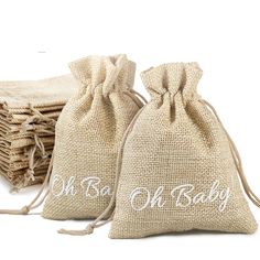 burlap bags with the word oh baby printed on them