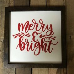 a merry and bright sign mounted on a wooden wall