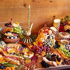 a table topped with lots of different types of food