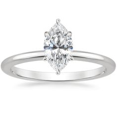 a white gold engagement ring with an oval cut diamond