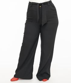 These chic 1950s style plus size wide leg trousers are crafted in a black woven blend and features a thick waistband that is secured by a front zipper and button closure. Complete with a black self-tie sash, functional side pockets, and faux back pockets!.Available in sizes XS-5X while supplies last. | Unique Vintage Plus Size 1950S Black Wide Leg Trousers | Size 2X/18 Plus Size Wide Leg, Vintage Plus Size, Black Wide Leg Trousers, 1950s Style, 1950s Fashion, Wide Leg Trousers, Unique Vintage, Front Zipper, Vintage Inspired