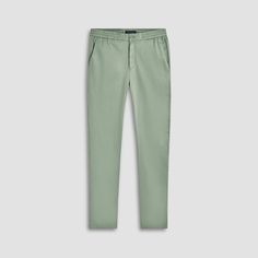 The Tristan pants, crafted from a premium linen-cotton blend with added stretch, offer a breathable and flexible fit. The buttoned zipper fly ensures easy wear, while the elasticized waistband, coupled with an inner drawstring, provides a customizable and secure fit. They also feature side front pockets and two rear welt pockets. Fitted Linen Chinos Casual Style, Fitted Linen Casual Chinos, Summer Tapered Leg Chinos In Chino Cotton Twill, Summer Straight Leg Chino Cotton Twill Bottoms, Spring Cotton Chinos With Standard Cut Leg, Summer Straight Leg Chino Bottoms, Summer Tapered Leg Chino Cotton Twill Pants, Stretch Linen Tapered Leg Pants, Green Chino Cotton Twill Bottoms With Pockets