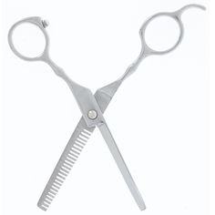 a pair of scissors with a comb and eye glasses on the top of each pair