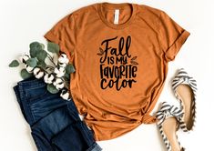 "Fall Is My Favorite Color Shirt | Hello Fall Shirt | Its Fall Yall | Gift For Fall | Pumpkin T Shirt | Fall Shirt Women | Autumn Leaves Tee How To Order: 1 - Please, check and review all photos 2 - Choose your t-shirt size and color *Different styles of shirts may have different shades of same color choice due to different manufacturer brands. *For this reason, we recommend you to match shirts from the same styles if you want precisely matching colors (exa. Unisex, V-neck, Tank top, etc.). 3 - Fall Tee Shirts, Pumpkin Pies, Fall Shirts Women, Fall Tee, Pumpkin Shirt, Fall Shirt, Soft Textiles, Thanksgiving Shirts, Fall Shopping