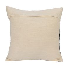 a white pillow with black piping on the front and back side, sitting against a white background