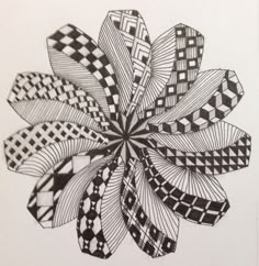 a black and white drawing of a flower with checkered petals on it's petals