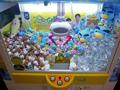 a vending machine filled with lots of stuffed animals