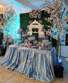 a table topped with cupcakes and desserts