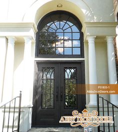 the front door to an elegant home