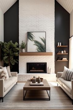 a living room with two couches and a coffee table in front of a fireplace