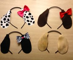 four different types of hair bows on top of a wooden table with polka dot designs