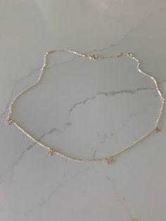 This 14K Gold MAMA Necklace is a beautiful, handcrafted piece of jewelry ideal for everyday wear. It is crafted exclusively in 14K yellow gold and can be combined with other necklaces for a layered look. Perfect for any special occasion like Valentine's Day, Mother's Day, Birthdays, Anniversaries and Christmas.♦ Materials: 14K Yellow Gold♦ Available colors: Yellow Gold♦ Necklace measurements: 16"-18" inches♦ Letters Measurement: 5MM height--------------------------------------------------------- Dainty Sterling Silver Custom Necklace For Everyday, Dainty Sterling Silver Necklace For Everyday, Silver-colored Gold Chain Necklace For Wedding, Classic Silver Name Necklace With Delicate Chain, Silver Custom Necklace In Dainty Style, Dainty 14k Gold Necklace In Silver Color, Dainty 14k Gold Custom Necklace In Silver, Dainty Sterling Silver Custom Necklace, Silver 14k Gold Initial Pendant Necklace