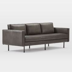 a gray leather couch with metal legs and arms, viewed from the front view on an isolated white background